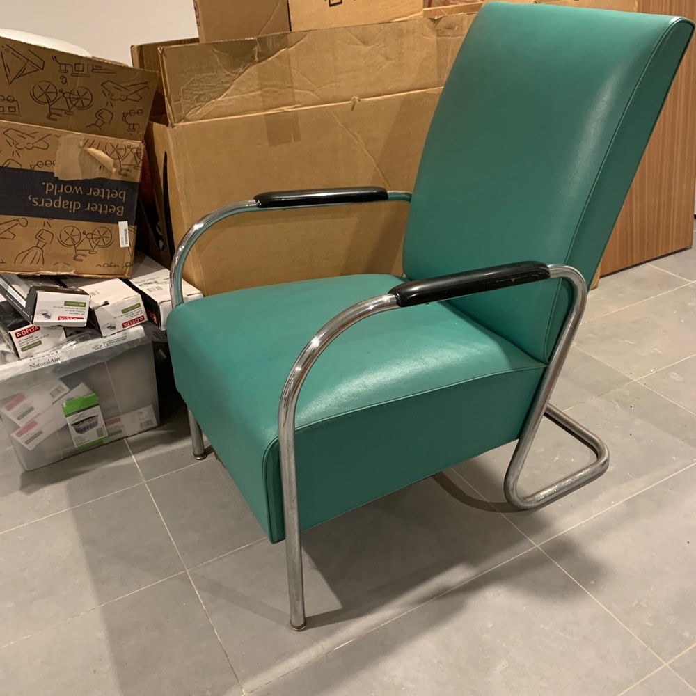 Vintage turquoise leather chair